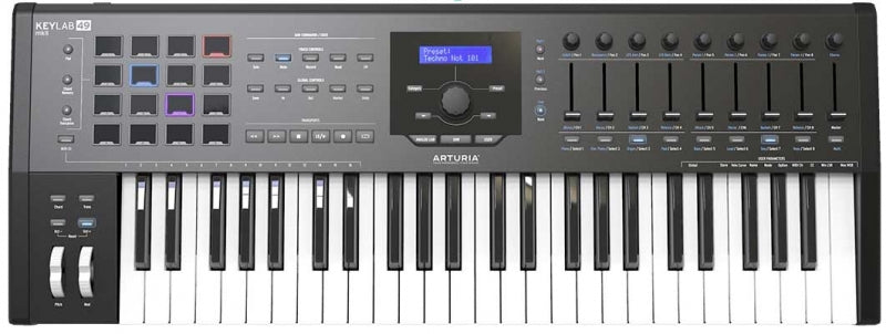 Black 49-key MIDI controller keyboard with pads, knobs, wheels, and an LCD screen in the center.