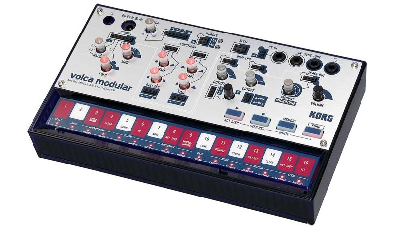 Compact Korg Volca Modular synthesizer with multiple knobs, buttons, and 3.5mm audio jacks on a white panel with red keypad.