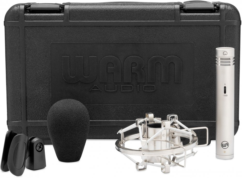 Silver cylindrical microphone with switch and accessories in front of a black carrying case with WARM AUDIO logo