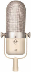 Front view of a beige and silver microphone with metal mesh grille and adjustable side screws.
