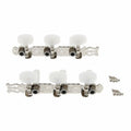 Set of two metal guitar tuner strips with white tuning pegs and accompanying screws on white background.