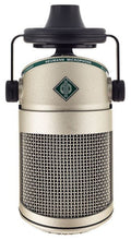 Silver and black Neumann microphone with wire mesh grille and suspension mount.