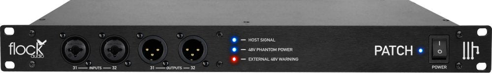 Black audio patchbay front panel with combination input jacks, XLR output connectors, indicator LEDs, and power switch.