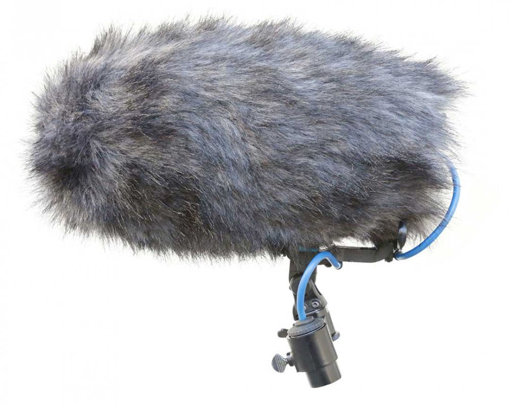 Shotgun microphone covered with gray furry windscreen mounted on a shock mount with attached blue cable.