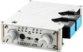 White and silver audio device with two rotary knobs and fiber optic connectors on one side