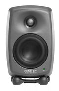 Front view of a gray Genelec studio monitor speaker with two drivers and a green indicator light.