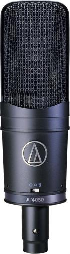 Black studio microphone with metal mesh grille and circular connector at bottom