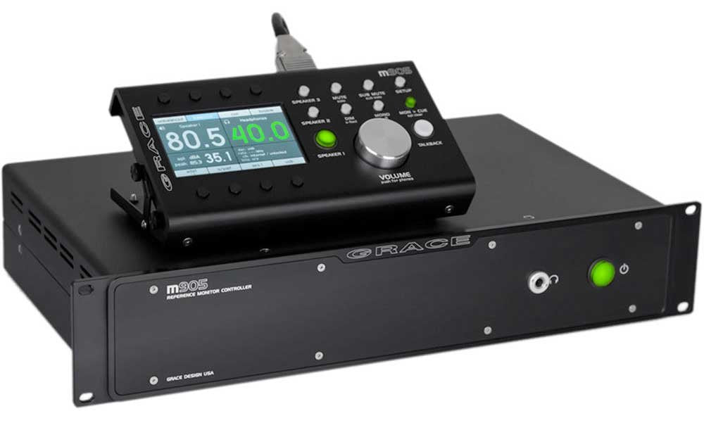 Black Grace Design m905 reference monitor controller with control panel showing volume and speaker settings.