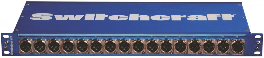 Blue rackmount panel with sixteen black XLR female connectors and Switchcraft branding.
