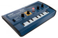 Blue KORG monotron Duo analogue ribbon synthesizer with keyboard, knobs, and a switch.