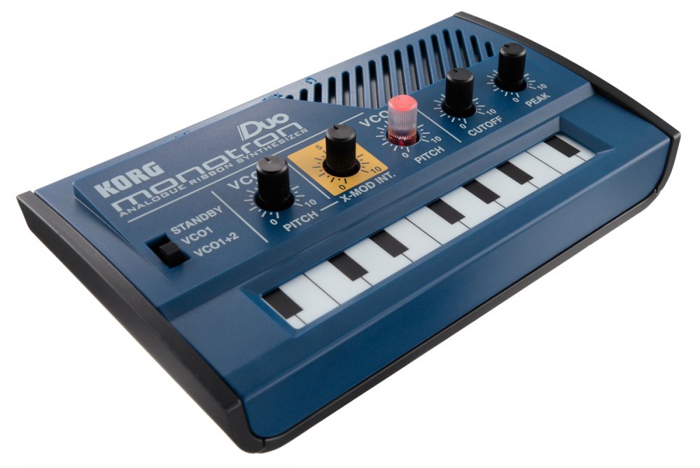 Blue KORG monotron Duo analogue ribbon synthesizer with keyboard, knobs, and a switch.