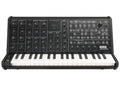 Black keyboard synthesizer with multiple knobs and patch cable jacks labeled KORG synthesizer.