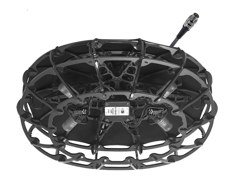 Four SCHOEPS CCM 41 L compact microphones mounted in a rectangular ORTF Surround array inside a fur-covered outdoor windshield, shown with its multicore splitter cabling.