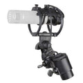Gray microphone capsule labeled MK 4 mounted in a black shock mount with attached cable.