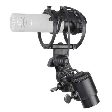 Gray microphone capsule labeled MK 4 mounted in a black shock mount with attached cable.