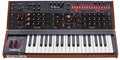 Analog synthesizer keyboard with modulation controls, oscillator section, filter, envelopes, and multiple illuminated buttons and knobs.