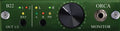 Front panel of a green electronic audio device with indicator lights, a large rotary knob, and a 1/4 inch monitor jack.