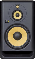 Black studio monitor speaker with two yellow drivers and KRK Systems logo on the front.