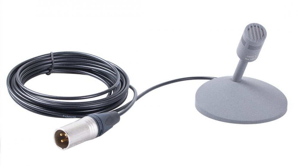 Gray tabletop microphone with attached cable and 3-pin male XLR connector on coiled cable.
