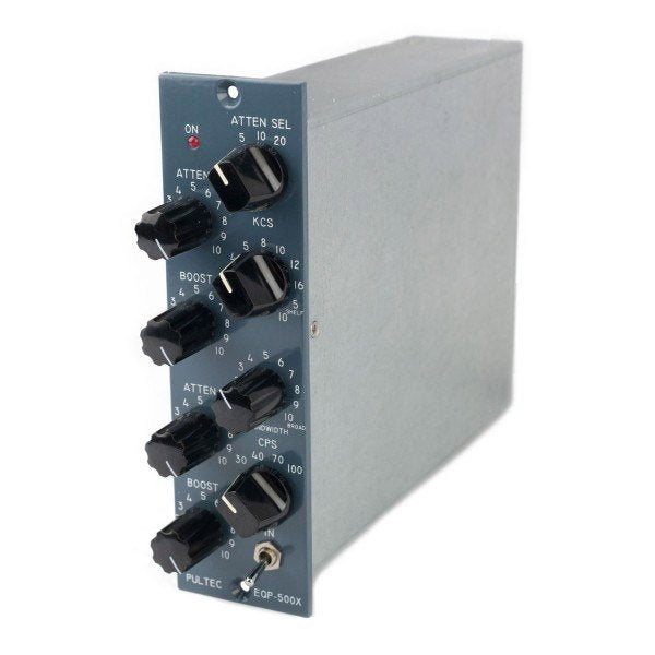 Gray audio processor module with multiple black rotary knobs and a toggle switch on the front panel