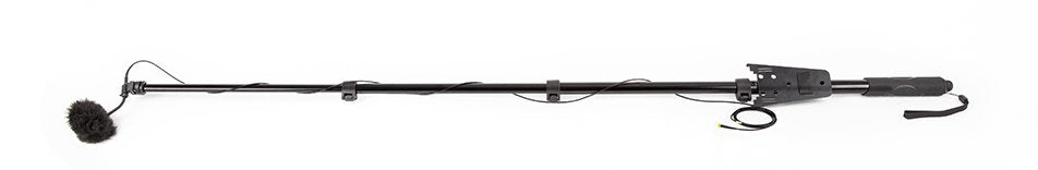 Black extendable boom pole microphone with fuzzy windscreen and cable attached.