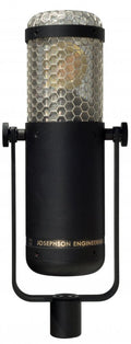 Large-diaphragm microphone with hexagonal mesh grille and black body labeled Josephson Engineering.
