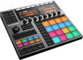 Black Native Instruments Maschine+ drum machine with colorful pads, knobs, buttons, two display screens, and various controls.