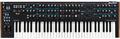 Black and wood synthesizer keyboard with multiple knobs, sliders, buttons, and a blue accent line across the top panel.