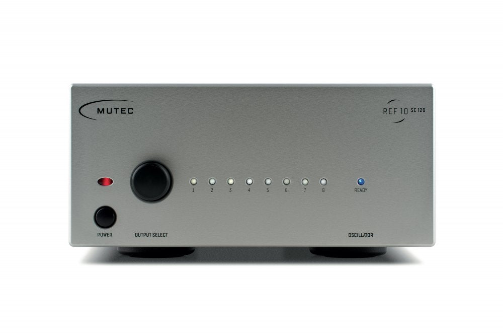 Gray MUTEC device with power button, rotary knob, 8 indicator lights, and ready light on front panel labeled REF 10 SE 120.
