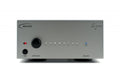 Gray MUTEC device with power button, rotary knob, 8 indicator lights, and ready light on front panel labeled REF 10 SE 120.