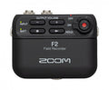 Black Zoom F2 Field Recorder with buttons, rotary dial, and two 3.5mm input jacks visible