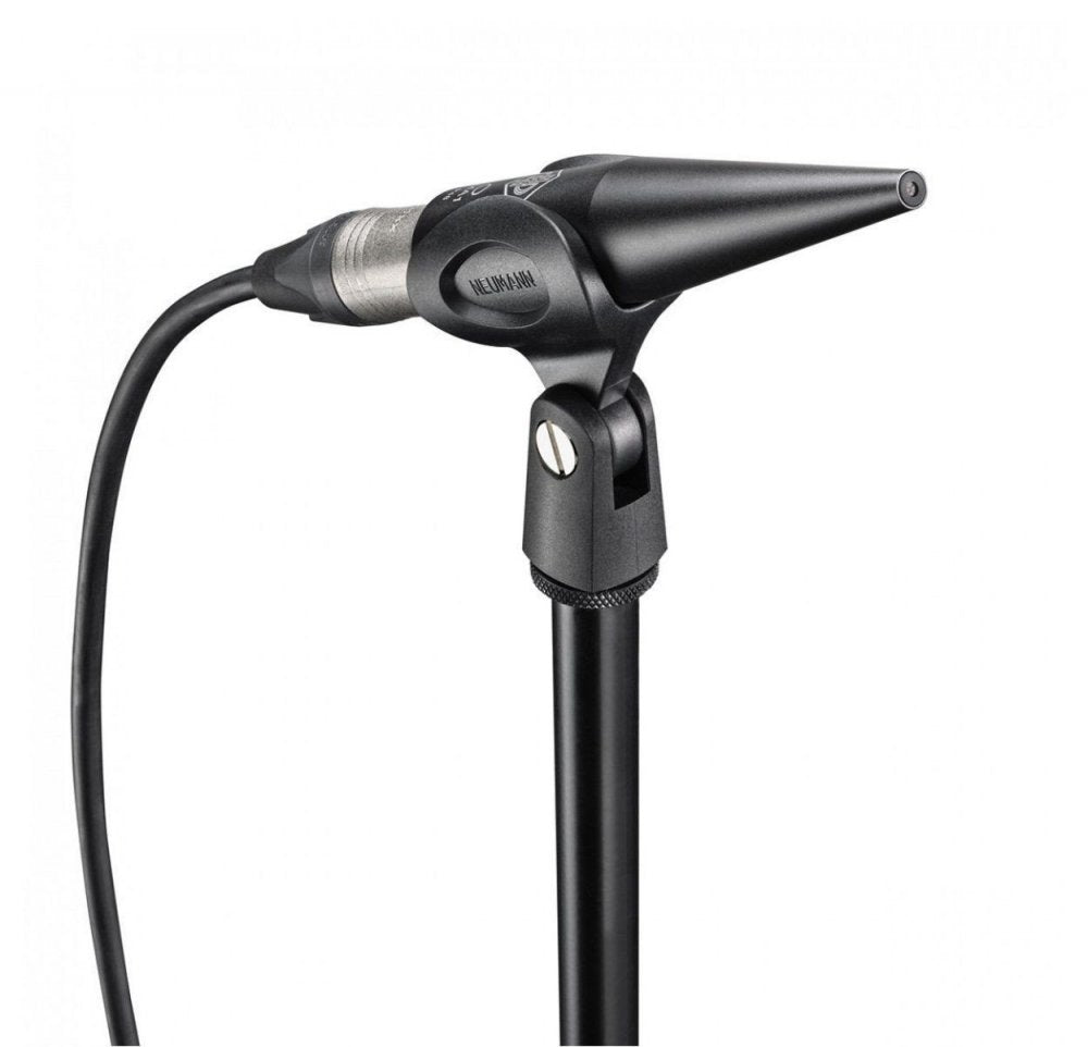 Black Neumann microphone with a conical head mounted on a stand with attached cable.