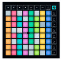 Top view of a black MIDI controller grid with colorful illuminated square pads and labeled function buttons on the right side.