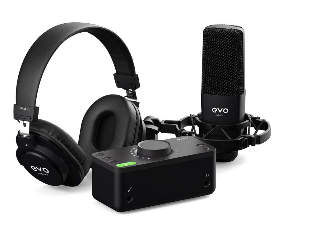 Black over-ear headphones, an audio interface, and a condenser microphone with shock mount on a white background.