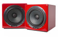 Two red square studio speakers with black cones and silver rings on the front, labeled Avantone.