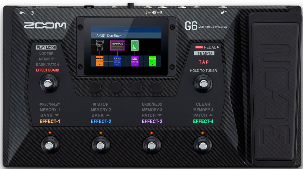 Top view of a ZOOM G6 multi-effects processor for guitar with display, footswitches, knobs, and expression pedal.