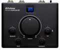 Black audio monitor controller with a central volume knob and four smaller buttons labeled Bluetooth, Mute, Pair, and Sub Bypass.