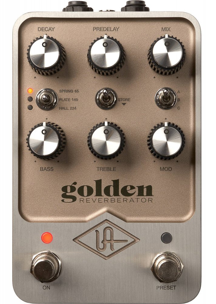 A gold and silver audio effects pedal with multiple knobs, toggle switches, and two footswitches labeled On and Preset.