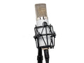 Silver condenser microphone with shock mount and attached cable on a stand against white background.