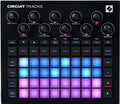 Top view of a Circuit Tracks grid-based music sequencer with knobs, buttons, and illuminated pads in blue and purple.