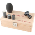 Microphone components including capsule, cut filter, foam windscreen, clip, and wooden storage box with engraved text.