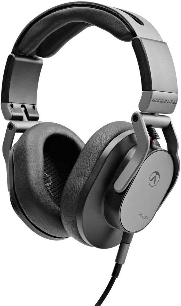 Black and silver over-ear headphones with padded ear cups and a wired cable connected to the left side.