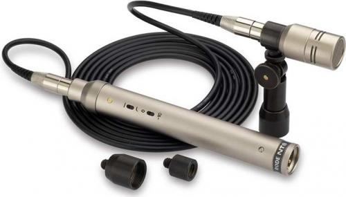 Silver microphone with attached cable, mounting clip, and two detachable threaded caps on white background.