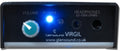 Front panel of a Glensound Virgil headphone amplifier with volume knob, power indicator, and headphone jacks.
