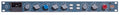 Front panel of a BAE 10DCF audio processor with multiple control knobs, meters, and indicator lights.