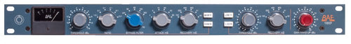 Front panel of a BAE 10DCF audio processor with multiple control knobs, meters, and indicator lights.