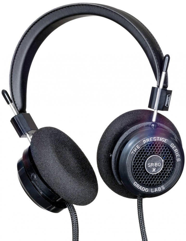 Black wired over-ear headphones with foam ear pads and metal headband supports.