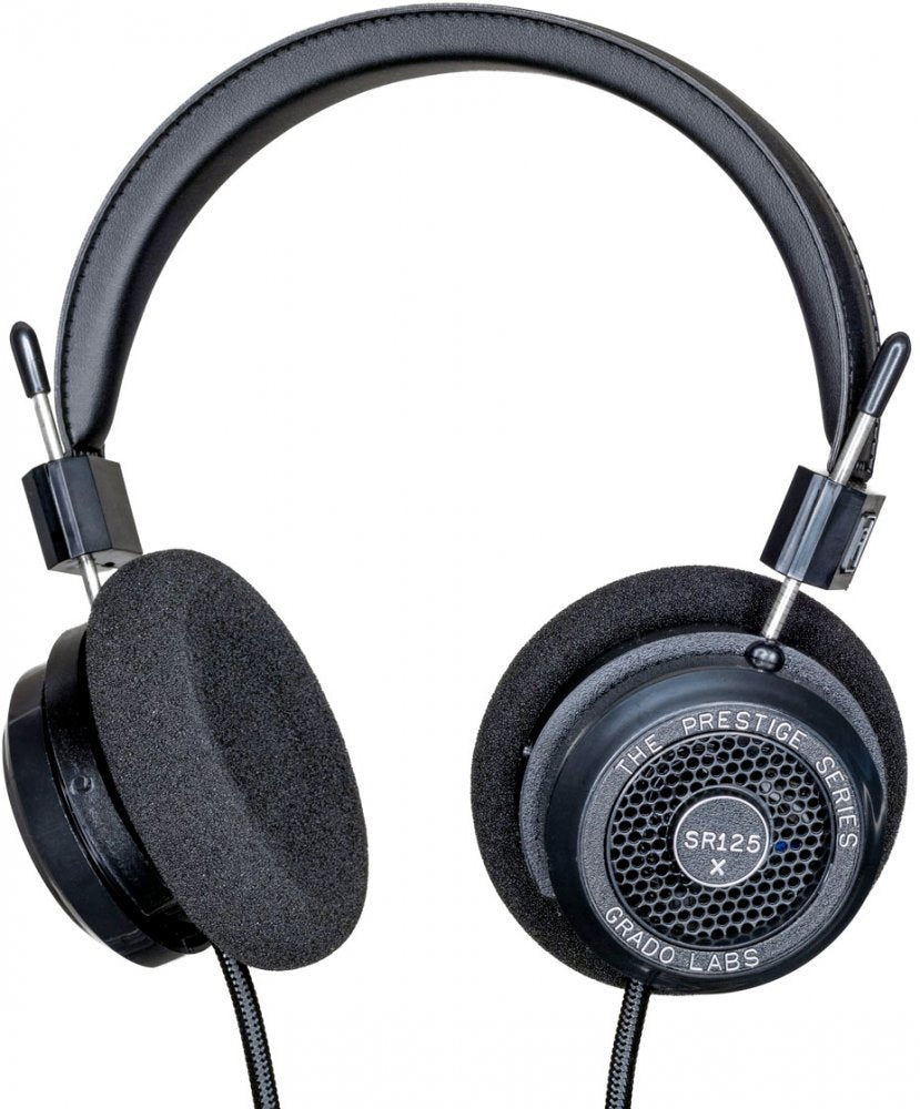 Black over-ear wired headphones with foam ear pads and metal headband frame, labeled The Prestige Series SR125x Grado Labs.