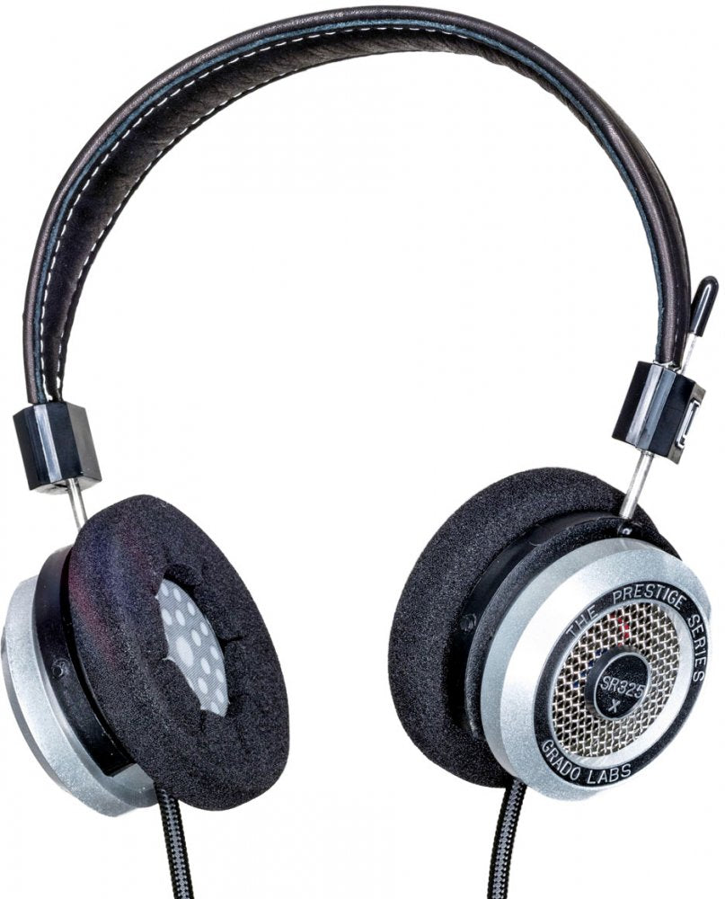 Over-ear wired headphones with foam ear pads, metal mesh ear cup design, and labeled as SR325x by Grado Labs.