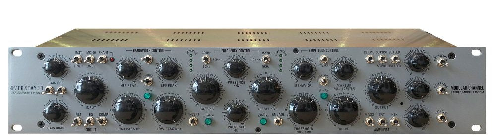 Front panel of a silver modular stereo preamp with multiple control knobs and switches.